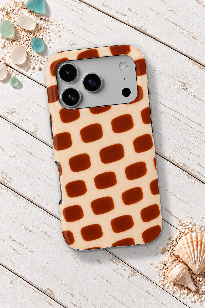 Sanibel Junonia Shell tough phone case on a white wooden table