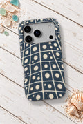 Gulf Coast Whale Shark tough phone case on a white wooden table